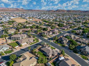 Aerial view of property's location featuring mountains