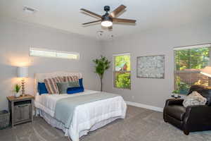 Bedroom with carpet flooring and a ceiling fan