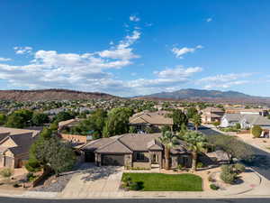 View of mountain background featuring nearby suburban area
