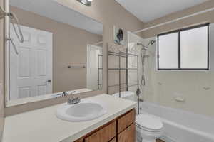 Bathroom with bathtub / shower combination and vanity