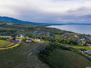 Aerial view of property's location featuring a nearby body of water