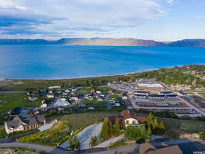 View of property location with nearby suburban area and a water and mountain view