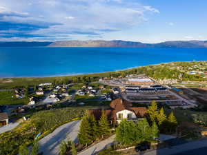 Aerial view of residential area featuring a water and mountain view