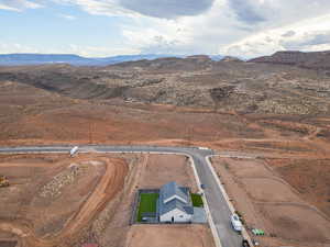 View of property location featuring a mountainous background and rural landscape