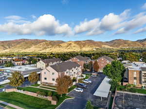 View of mountain backdrop with nearby suburban area
