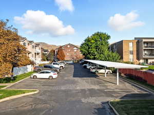 Uncovered parking lot with a residential view