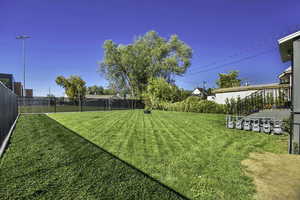 View of fenced backyard