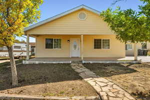 View of front of property featuring a porch