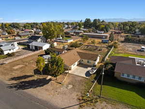 Aerial view of residential area featuring a mountain backdrop