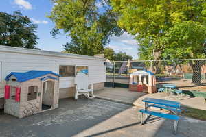 View of property's community with a patio area