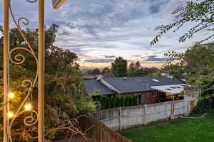 View of yard at dusk