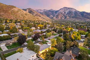 Aerial perspective of suburban area with a mountainous background