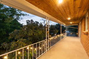 Balcony featuring a sunroom