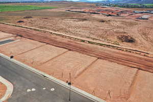 View of rural area with a mountainous background and a desert landscape