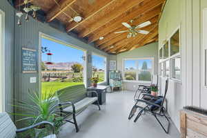 View of patio / terrace with a mountain view and a ceiling fan