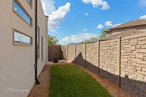 View of fenced backyard