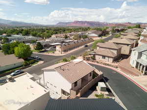Aerial view of residential area with a mountainous background