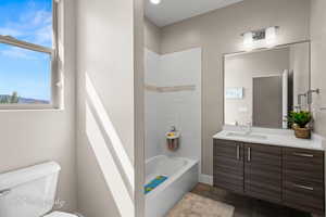 Full bath with bathtub / shower combination and vanity