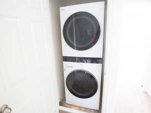 Washroom with stacked washing machine and dryer