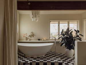 Bathroom featuring a soaking tub