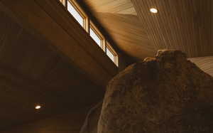 Detailed view of recessed lighting and wooden ceiling