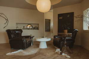 Bathroom featuring wood finished floors and baseboards