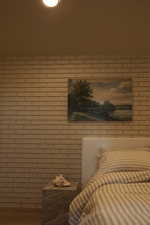 Bedroom with wood finished floors