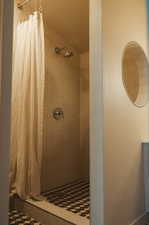 Bathroom with a tile shower