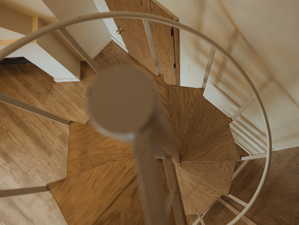 Staircase with wood finished floors