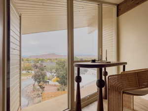 Doorway to outside with plenty of natural light
