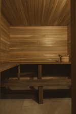Relaxing sauna / steam room featuring wooden ceiling and wooden walls