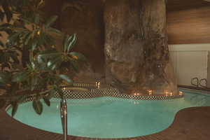 View of swimming pool featuring a pool