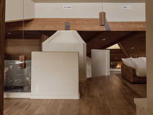 Bonus room featuring wood finished floors