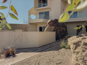 View of side of home featuring brick siding