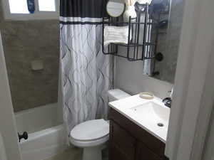 Full bathroom with vanity and shower / bathtub combination with curtain