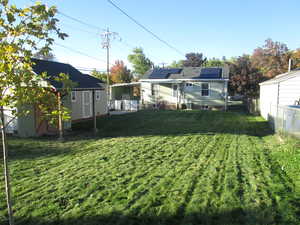 View of yard with a shed