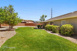 View of fenced backyard