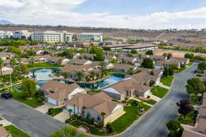 Aerial perspective of suburban area with a large body of water