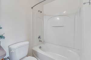 Master bathroom has large bathtub