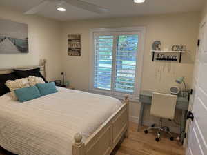 Bedroom with recessed lighting, light wood-type flooring, and ceiling fan