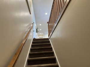 Stairs featuring recessed lighting