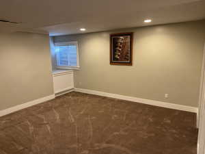 Below grade area featuring carpet and recessed lighting