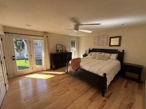Bedroom featuring access to outside, light wood finished floors, ceiling fan, a textured ceiling, and recessed lighting