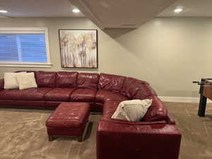 Living area featuring recessed lighting and carpet floors