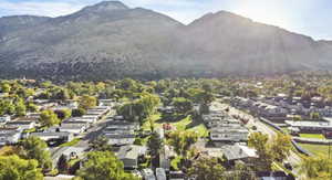 View of mountain background featuring nearby suburban area