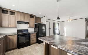 Kitchen featuring black appliances, hanging light fixtures, open shelves, recessed lighting, and under cabinet range hood