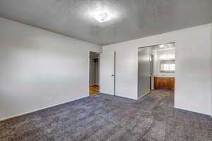 Unit B bedroom 2 with entrance to bathroom.