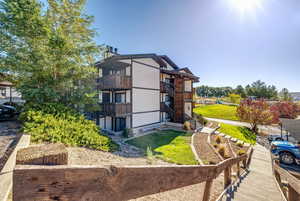 View of building exterior featuring stairs