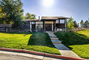 Front view of a what could be used as the office or clubhouse. This is currently rented as a 3-bedroom 2 bath unit.