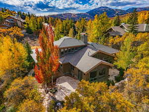 View from above of property featuring a mountainous background